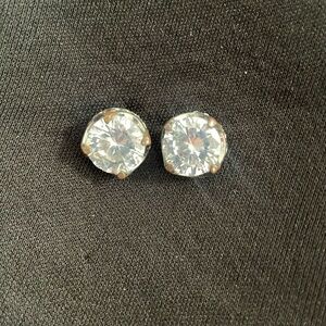 Diamond Stud Earrings.